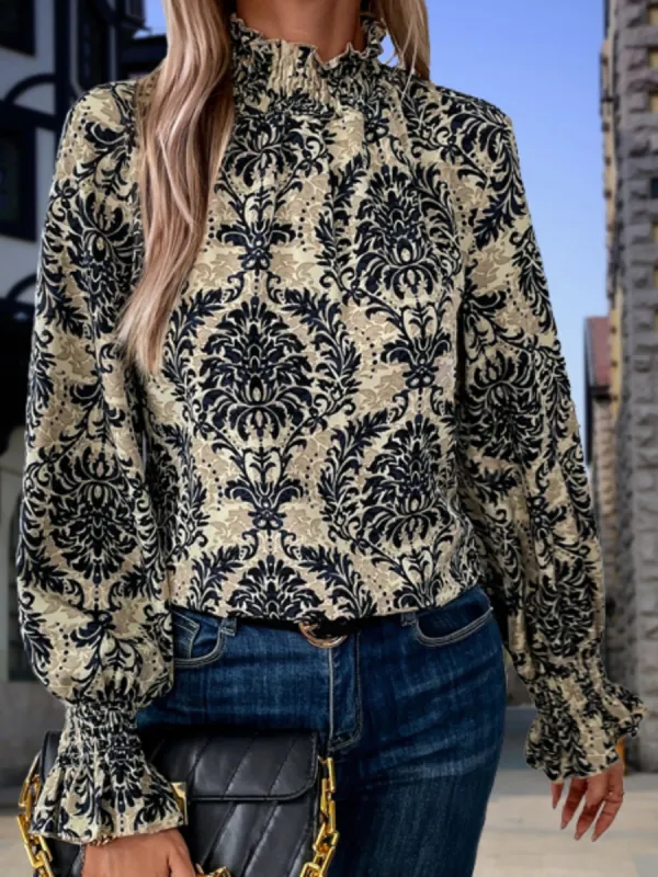 Smocked Printed Mock Neck Blouse sold by Charming Charlie
