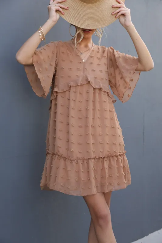 Swiss Dot V-Neck Flutter Sleeve Mini Dress sold by Charming Charlie