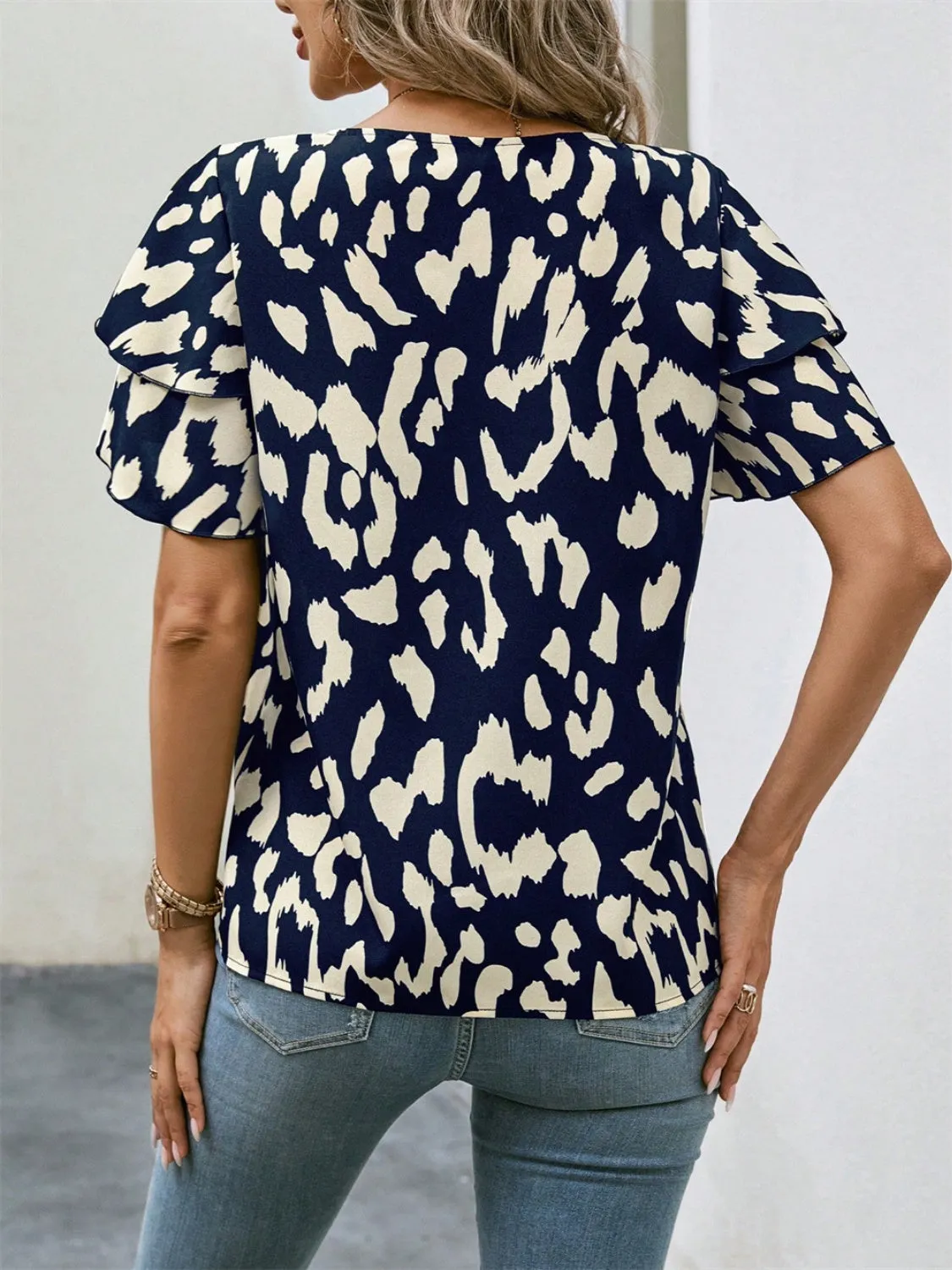 Ruffled Printed Round Neck Short Sleeve Blouse sold by Charming Charlie product image thumbnail 2