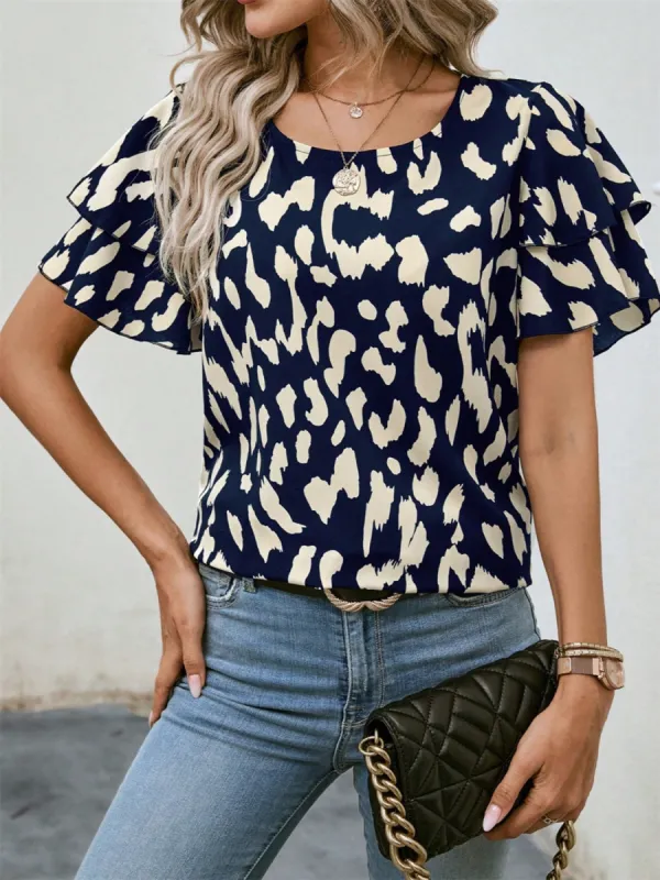 Ruffled Printed Round Neck Short Sleeve Blouse sold by Charming Charlie