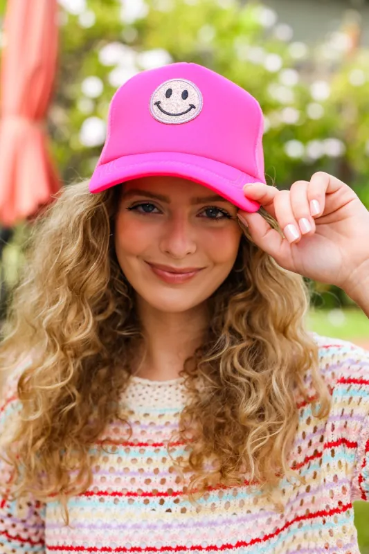 Neon Pink Glitter Smiley Face Mesh Trucker Hat sold by Charming Charlie