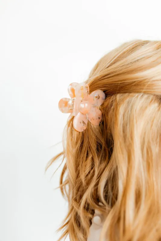 Gigi - Pearlized Peach sold by Charming Charlie