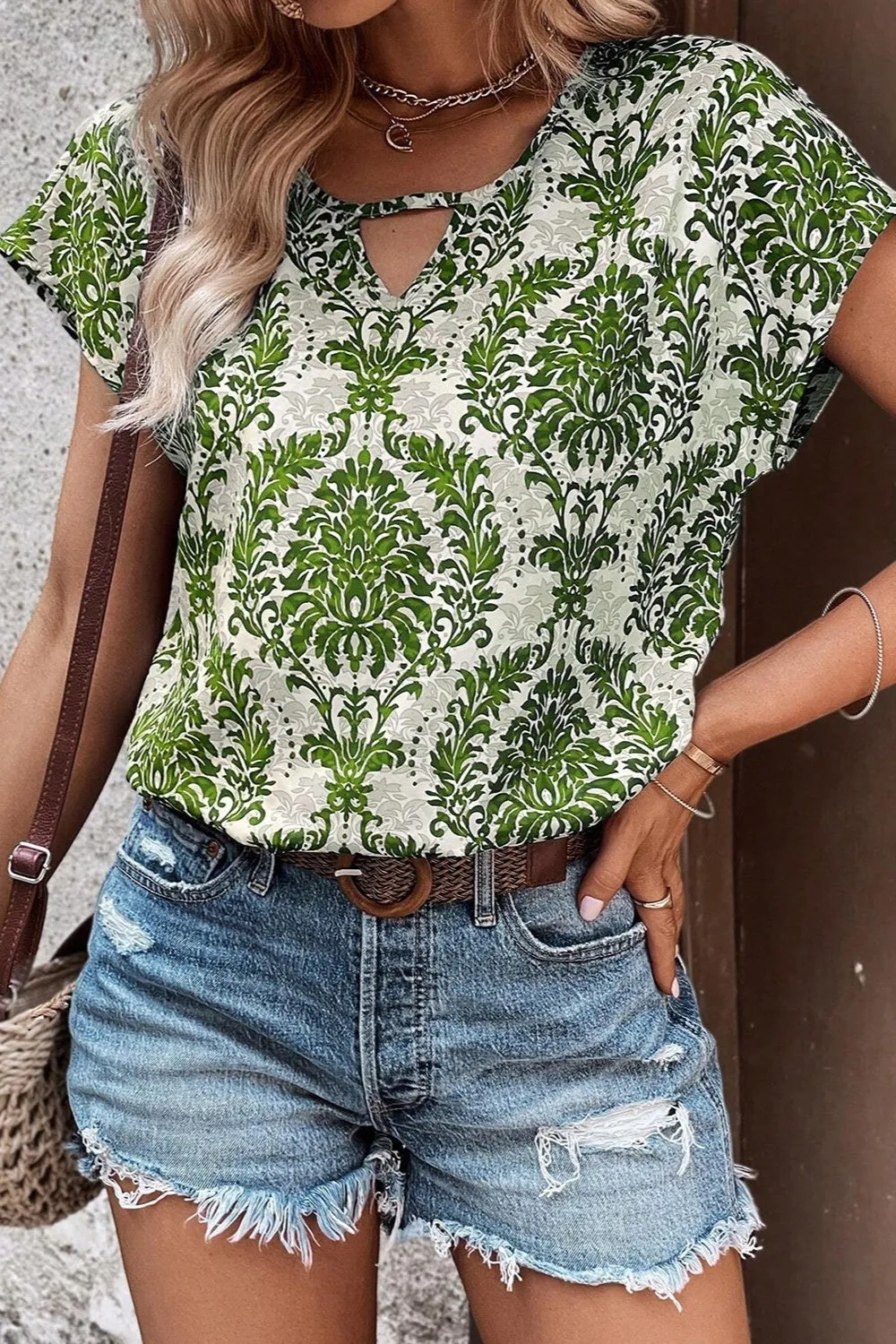 Cutout Printed Short Sleeve Blouse sold by Charming Charlie