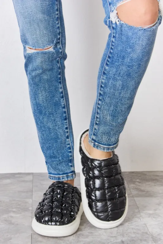 Melody Puffer Plush Slippers sold by Charming Charlie