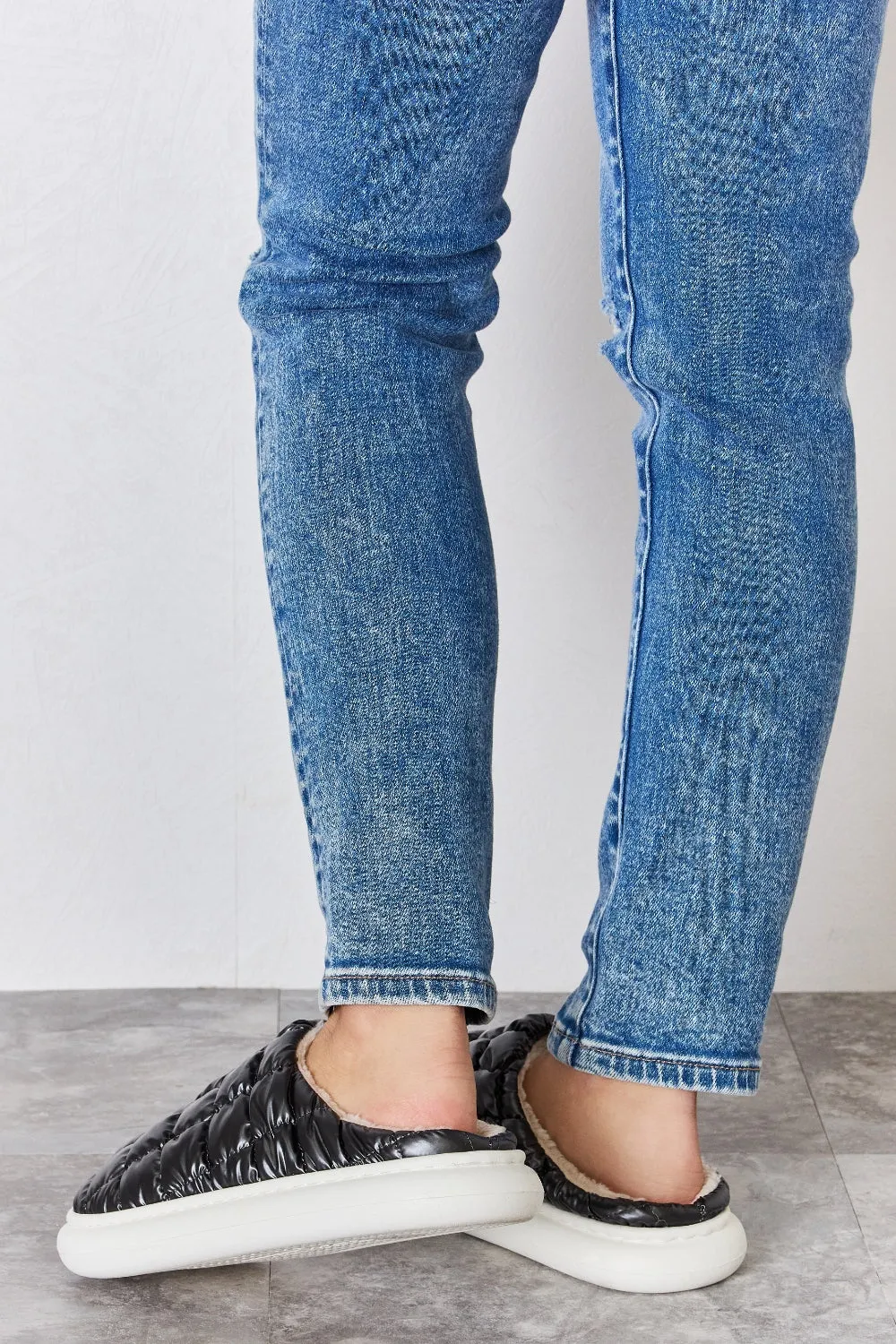 Melody Puffer Plush Slippers sold by Charming Charlie product image thumbnail 5