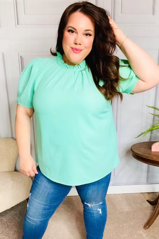 Follow Me Mint Frill Mock Neck Woven Top sold by Charming Charlie