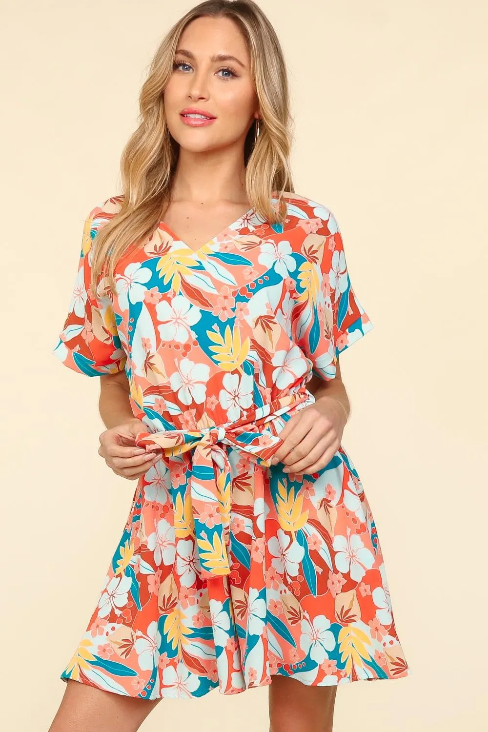 Haptics Tropical Floral Short Sleeve Tied Romper sold by Charming Charlie