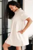 Tortured Poet Dress in Cream sold by Charming Charlie
