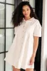 Tortured Poet Dress in Cream sold by Charming Charlie