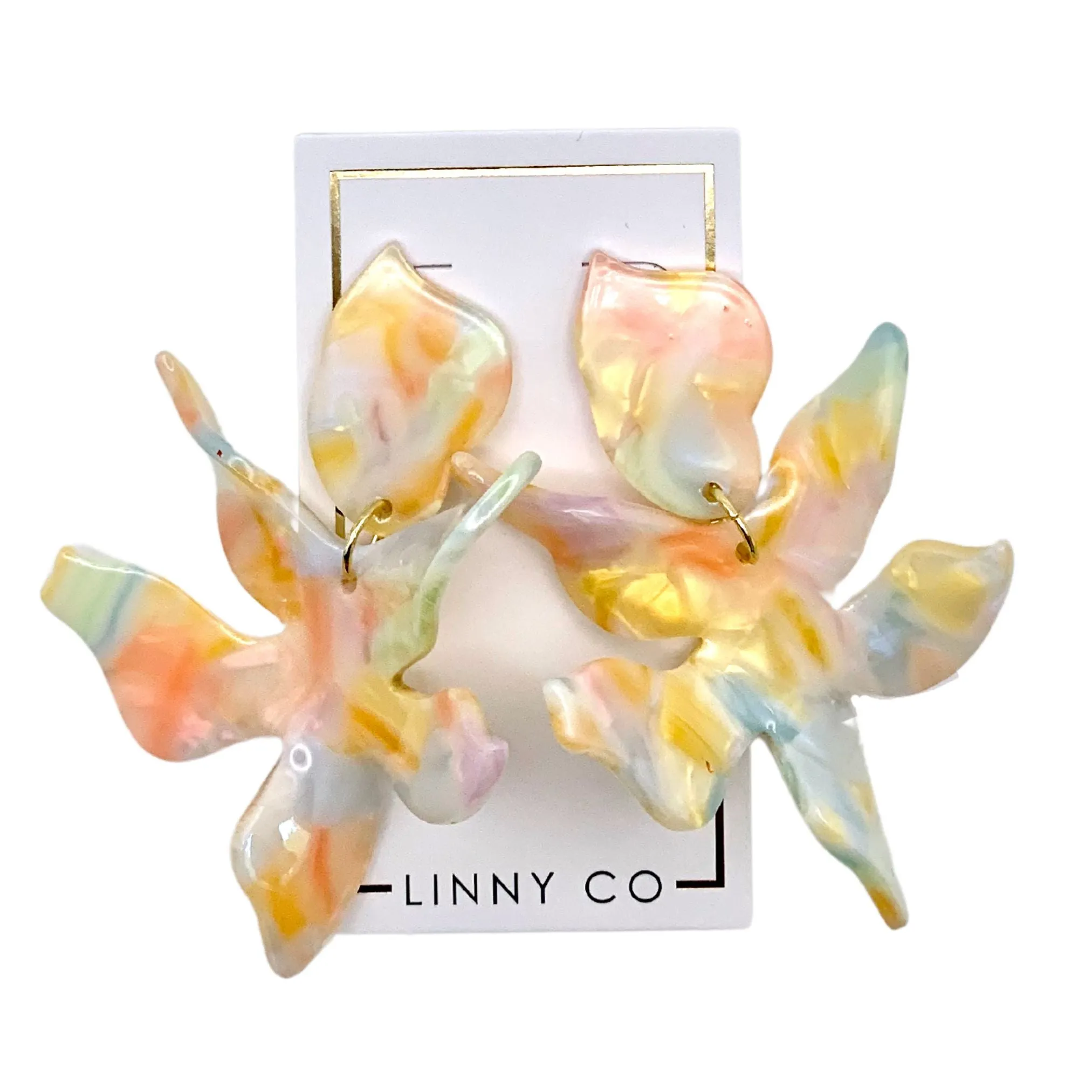 Flora - Rainbow Sherbert sold by Charming Charlie