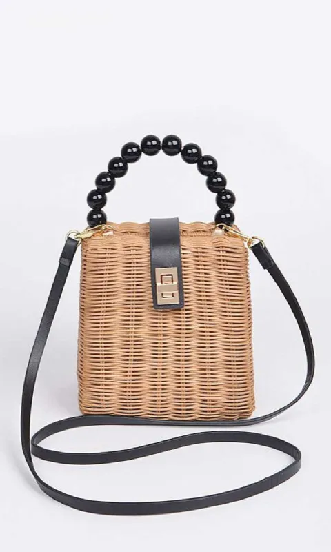 Beads Handle Straw Structure Clutch Swing Bag sold by Charming Charlie