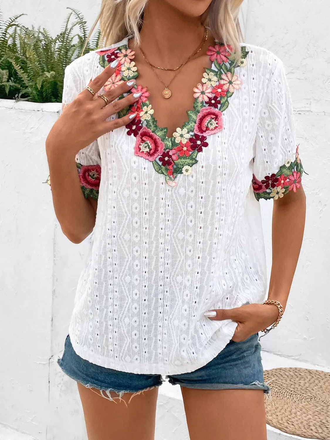 Eyelet Embroidered V-Neck Short Sleeve Blouse sold by Charming Charlie