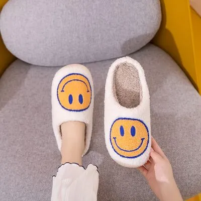 Melody Smiley Face Slippers sold by Charming Charlie