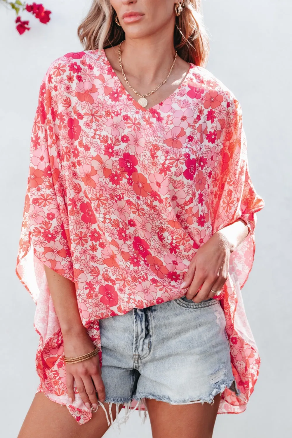 Floral V-Neck Three-Quarter Sleeve Blouse sold by Charming Charlie