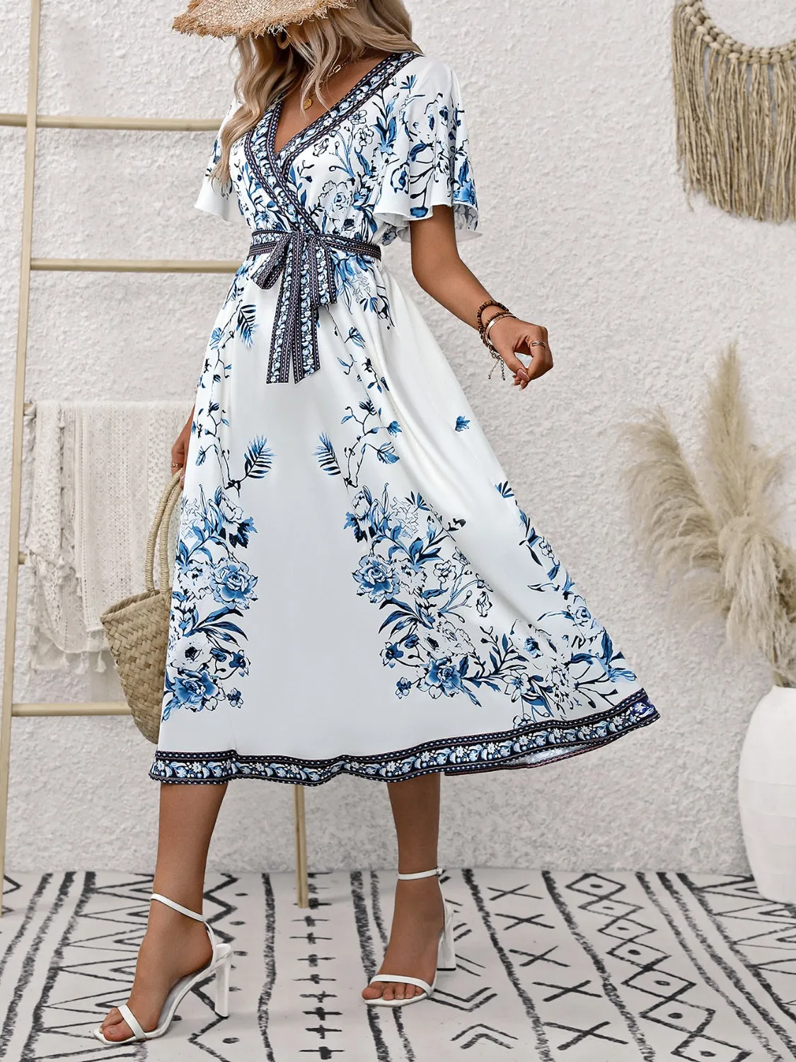 Printed Surplice Flutter Sleeve Dress sold by Charming Charlie product image thumbnail 5
