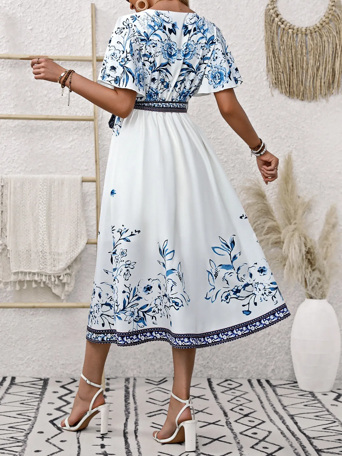 Printed Surplice Flutter Sleeve Dress sold by Charming Charlie product image thumbnail 2