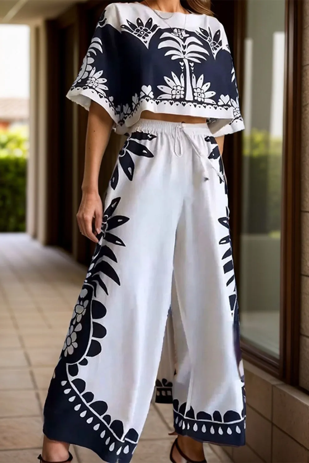 Printed Half Sleeve Top and Wide Leg Pants Set sold by Charming Charlie