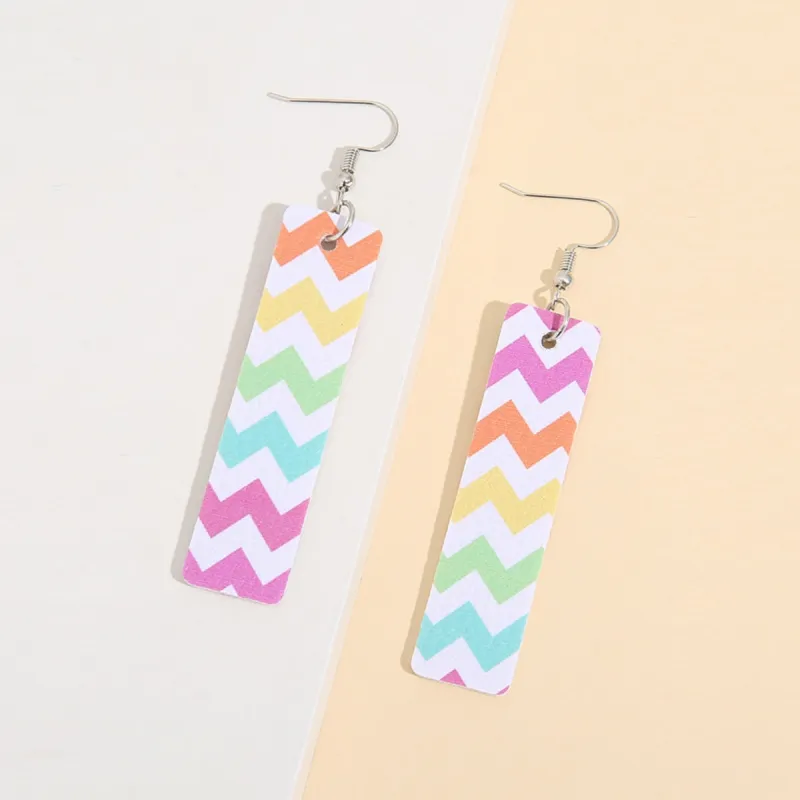 Leather Contrast Chevron Earrings sold by Charming Charlie