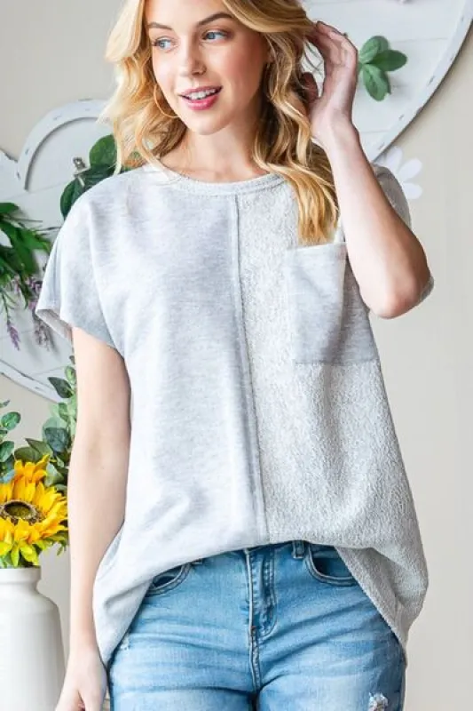 Heimish Full Size Pocketed Round Neck Short Sleeve T-Shirt sold by Charming Charlie
