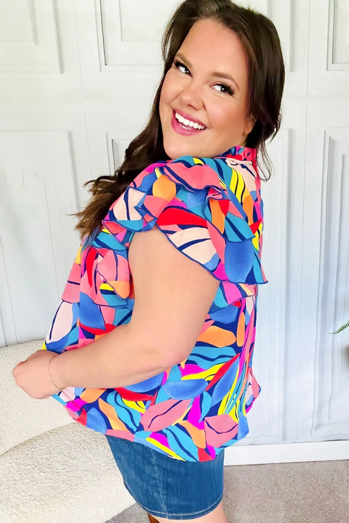 Tropical Vibes Blue & Pink Mock Neck Flutter Sleeve Top sold by Charming Charlie product image thumbnail 4
