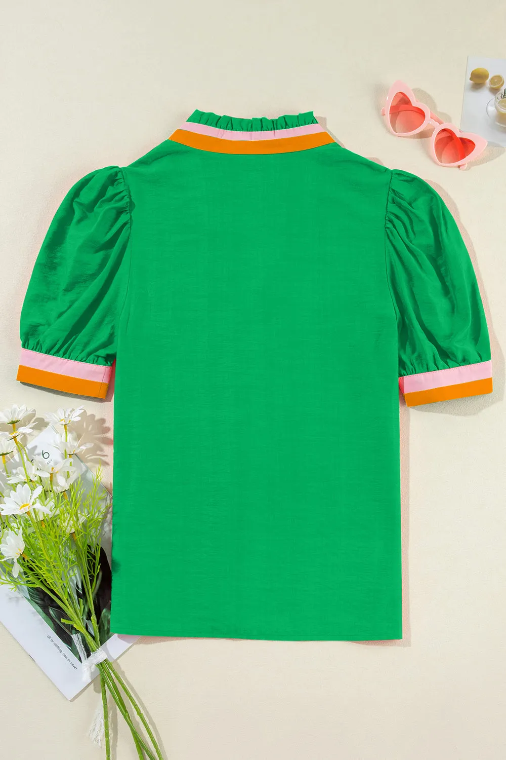 Contrast Trim Notched Short Sleeve Blouse sold by Charming Charlie product image thumbnail 2