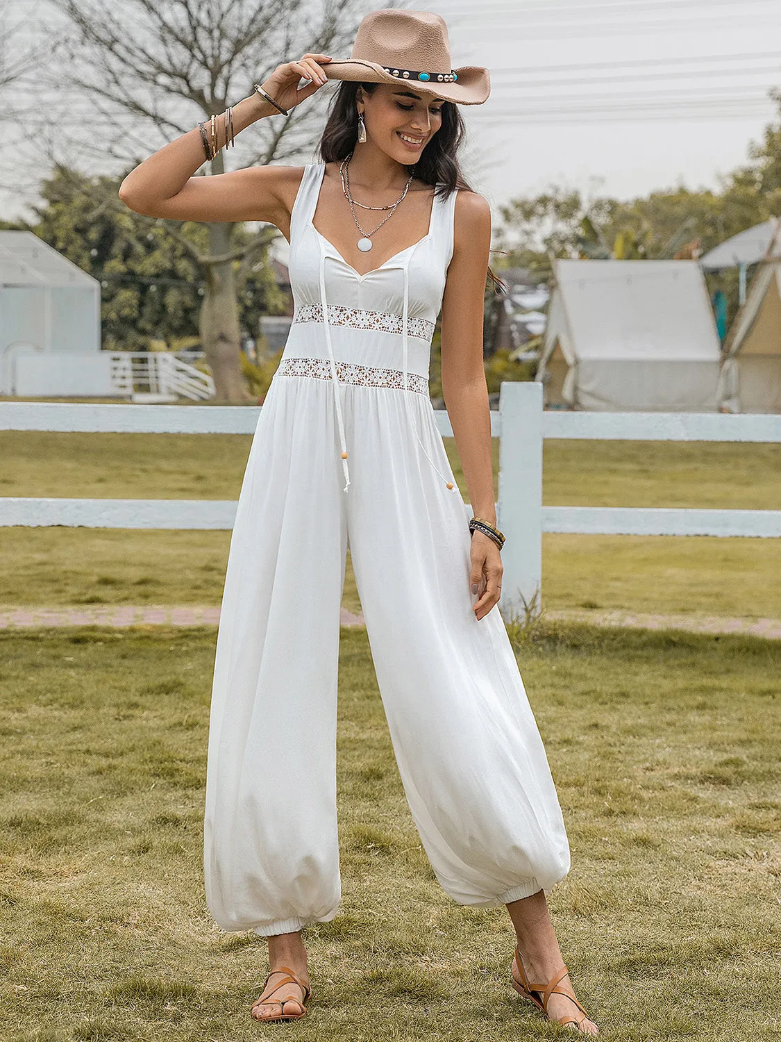 Backless Wide Strap Wide Leg Jumpsuit sold by Charming Charlie