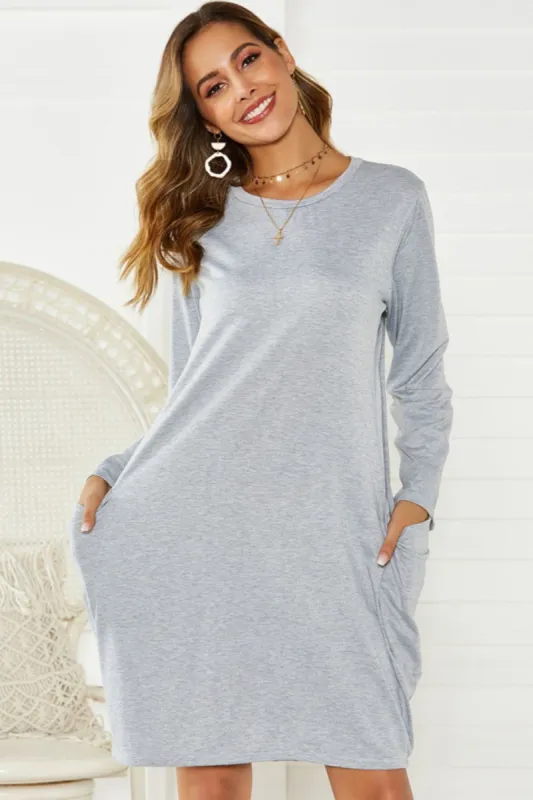 Pocketed Round Neck Long Sleeve Dress sold by Charming Charlie