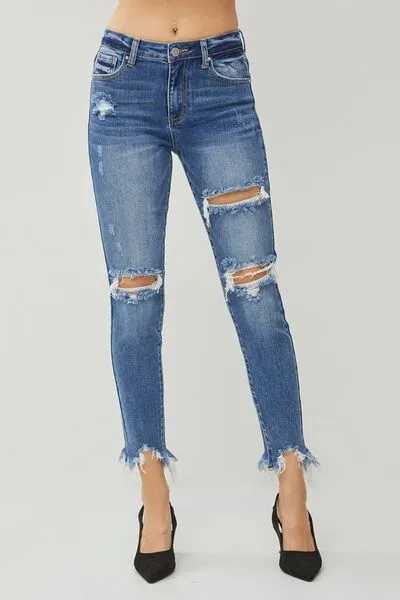 RISEN Distressed Frayed Hem Slim Jeans sold by Charming Charlie