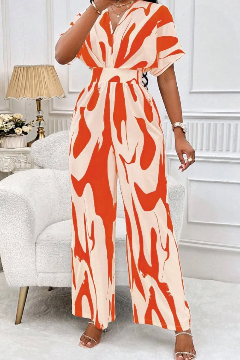 Printed V-Neck Short Sleeve Wide Leg Jumpsuit sold by Charming Charlie product image thumbnail 5