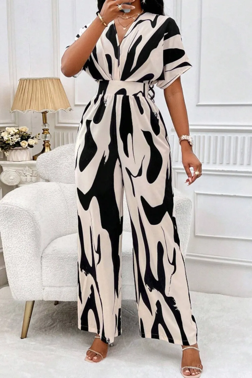 Printed V-Neck Short Sleeve Wide Leg Jumpsuit sold by Charming Charlie product image thumbnail 3