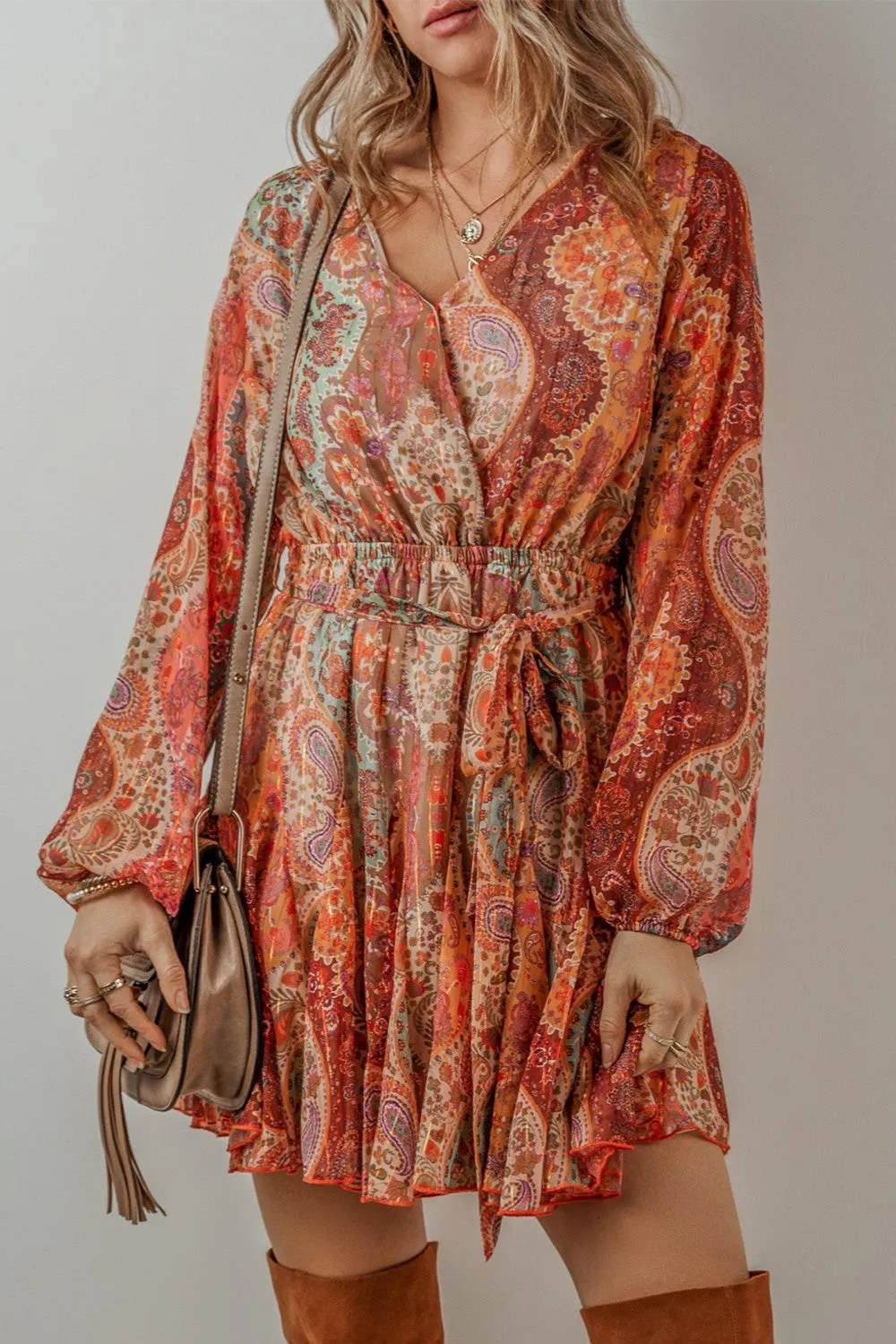Printed Surplice Long Sleeve Mini Dress sold by Charming Charlie