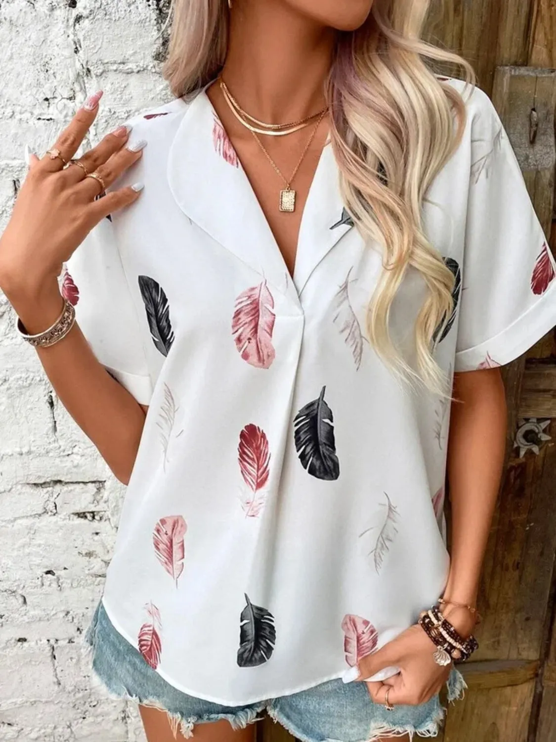 Full Size Printed Collared Neck Short Sleeve Blouse sold by Charming Charlie