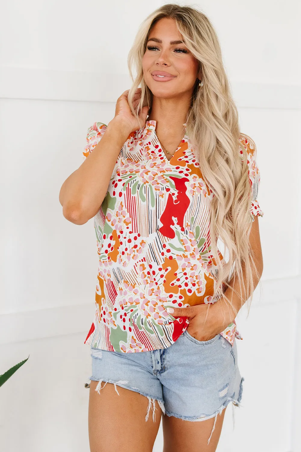 Printed Notched Short Sleeve Blouse sold by Charming Charlie product image thumbnail 3