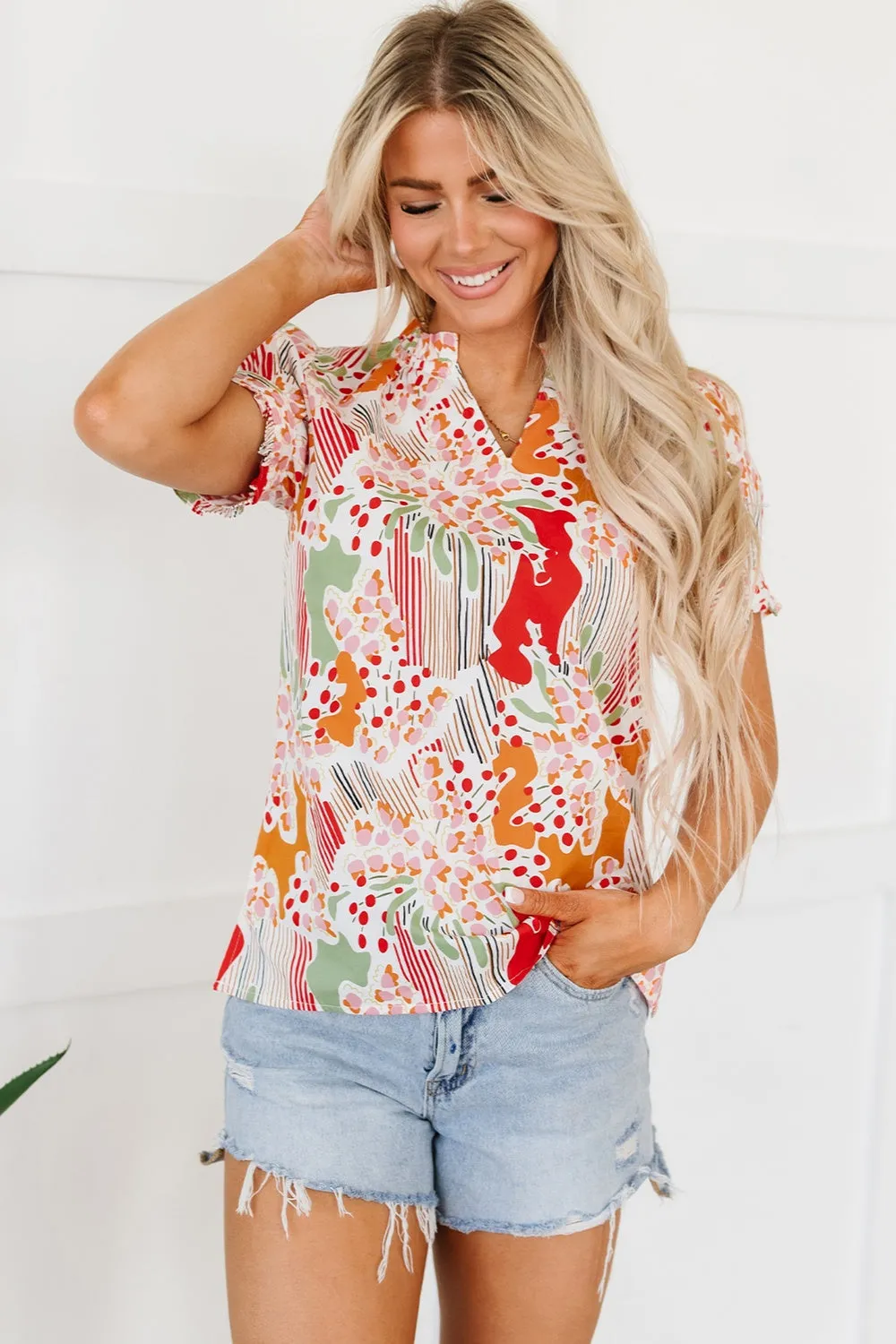 Printed Notched Short Sleeve Blouse sold by Charming Charlie product image thumbnail 4