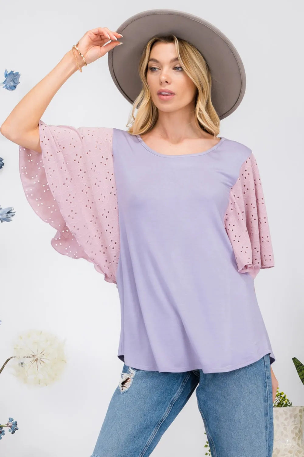 Celeste Full Size Contrast Eyelet Ruffle Sleeve Blouse sold by Charming Charlie