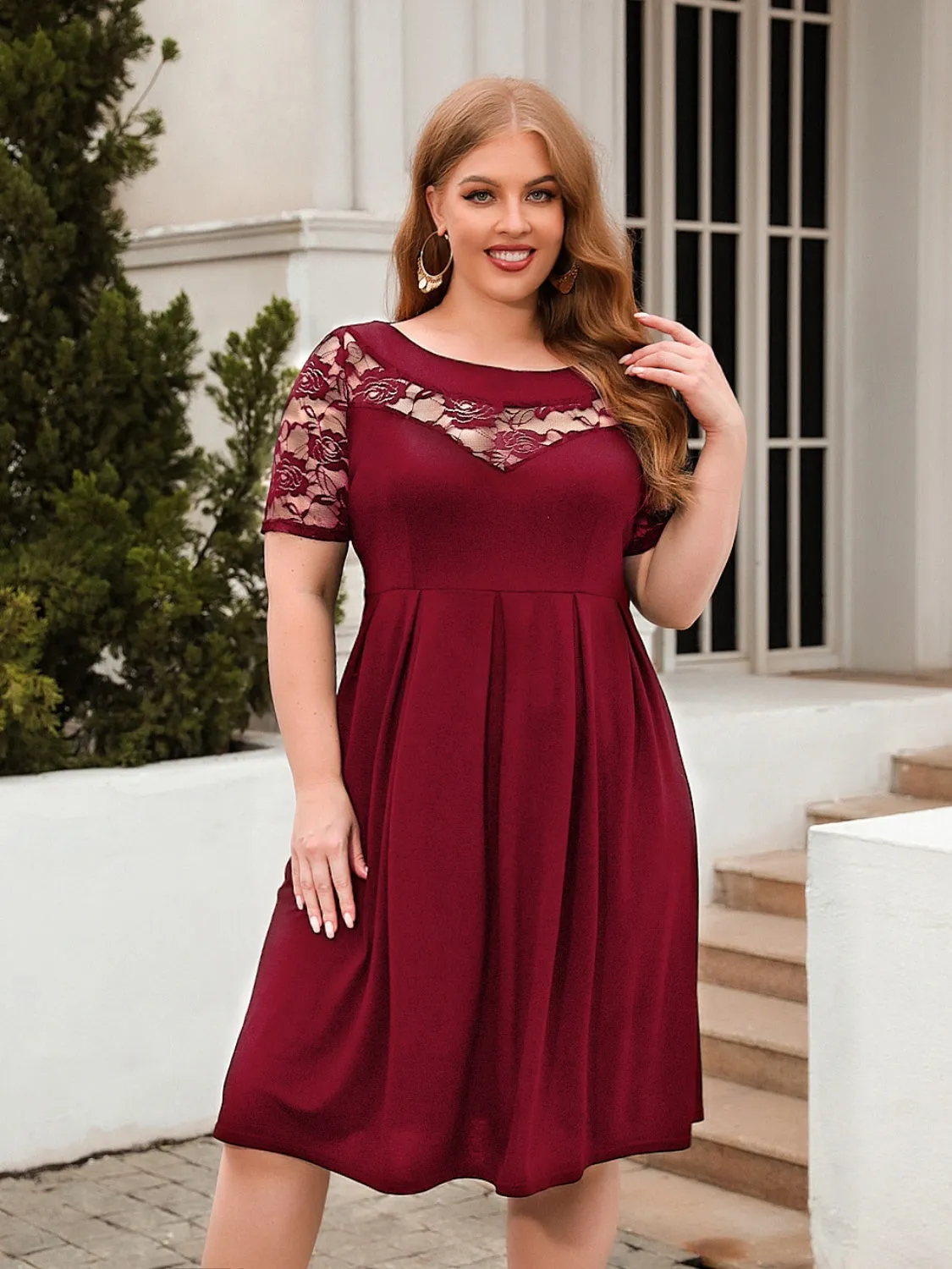 Plus Size Ruched Round Neck Short Sleeve Dress sold by Charming Charlie