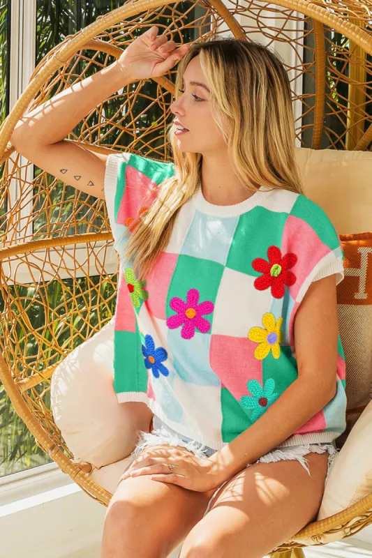 BiBi Flower Patch Checkered Sweater Vest sold by Charming Charlie