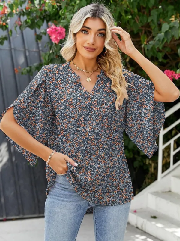Printed Notched Half Sleeve Blouse sold by Charming Charlie