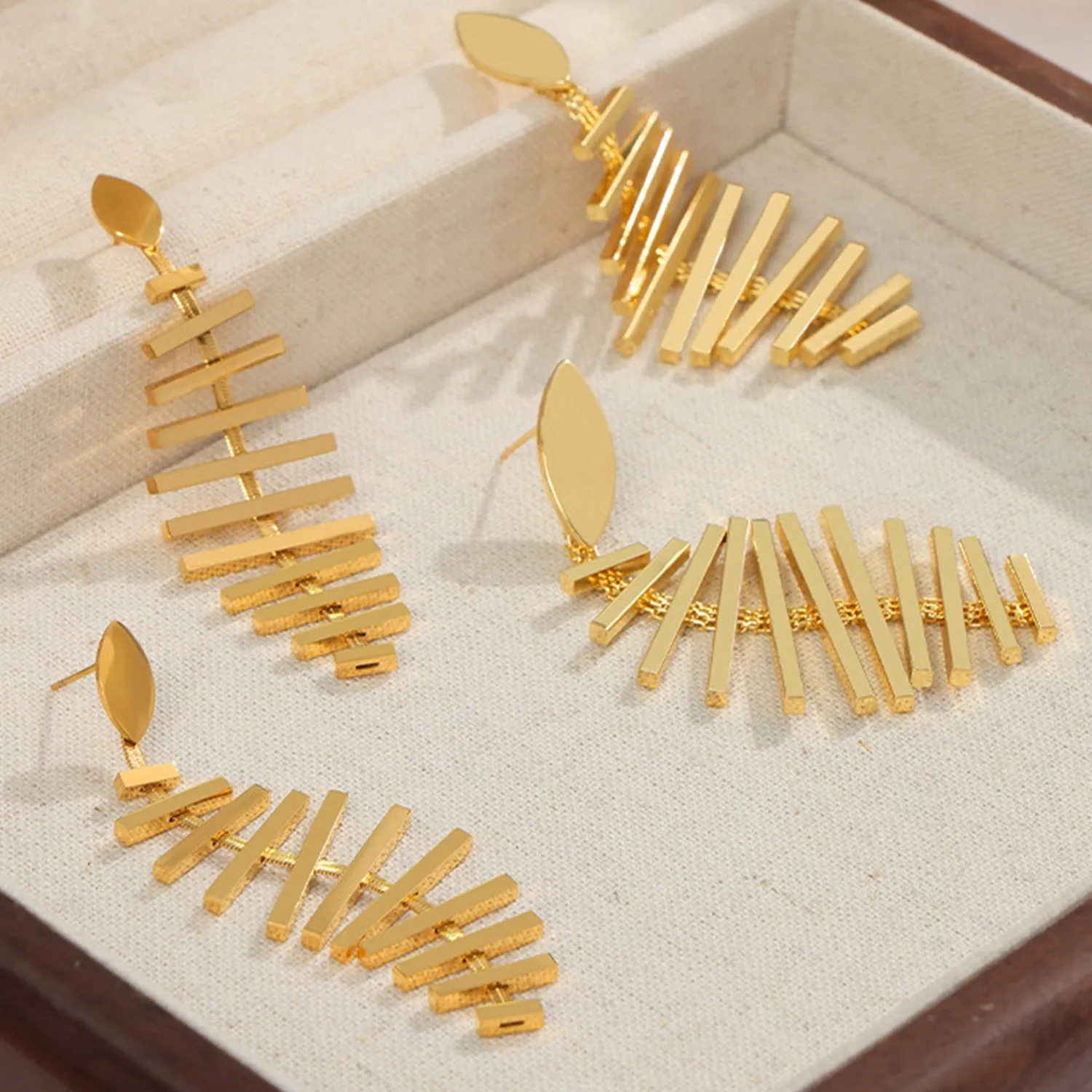 Titanium Steel Fishbone Shape Earrings sold by Charming Charlie product image thumbnail 2