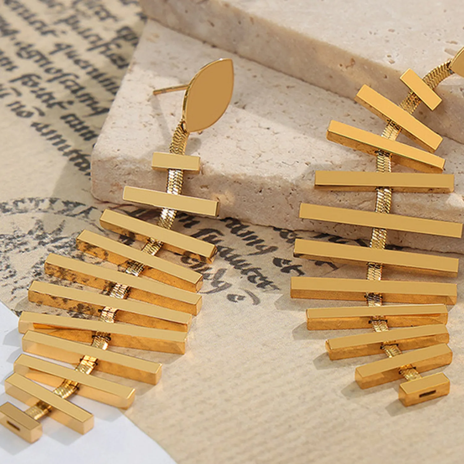 Titanium Steel Fishbone Shape Earrings sold by Charming Charlie product image thumbnail 3