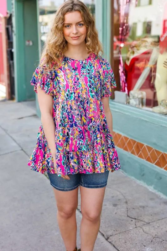 Femme' Fuchsia & Navy Floral Ruffle Hem Tiered Top sold by Charming Charlie