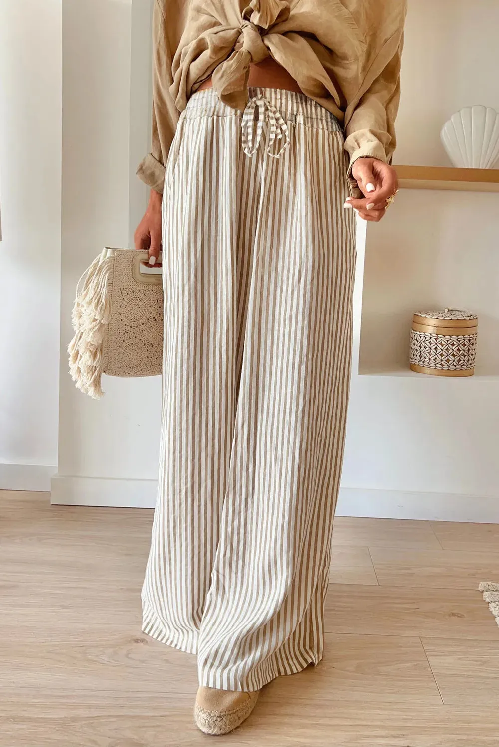 Pocketed Striped Wide Leg Pants sold by Charming Charlie