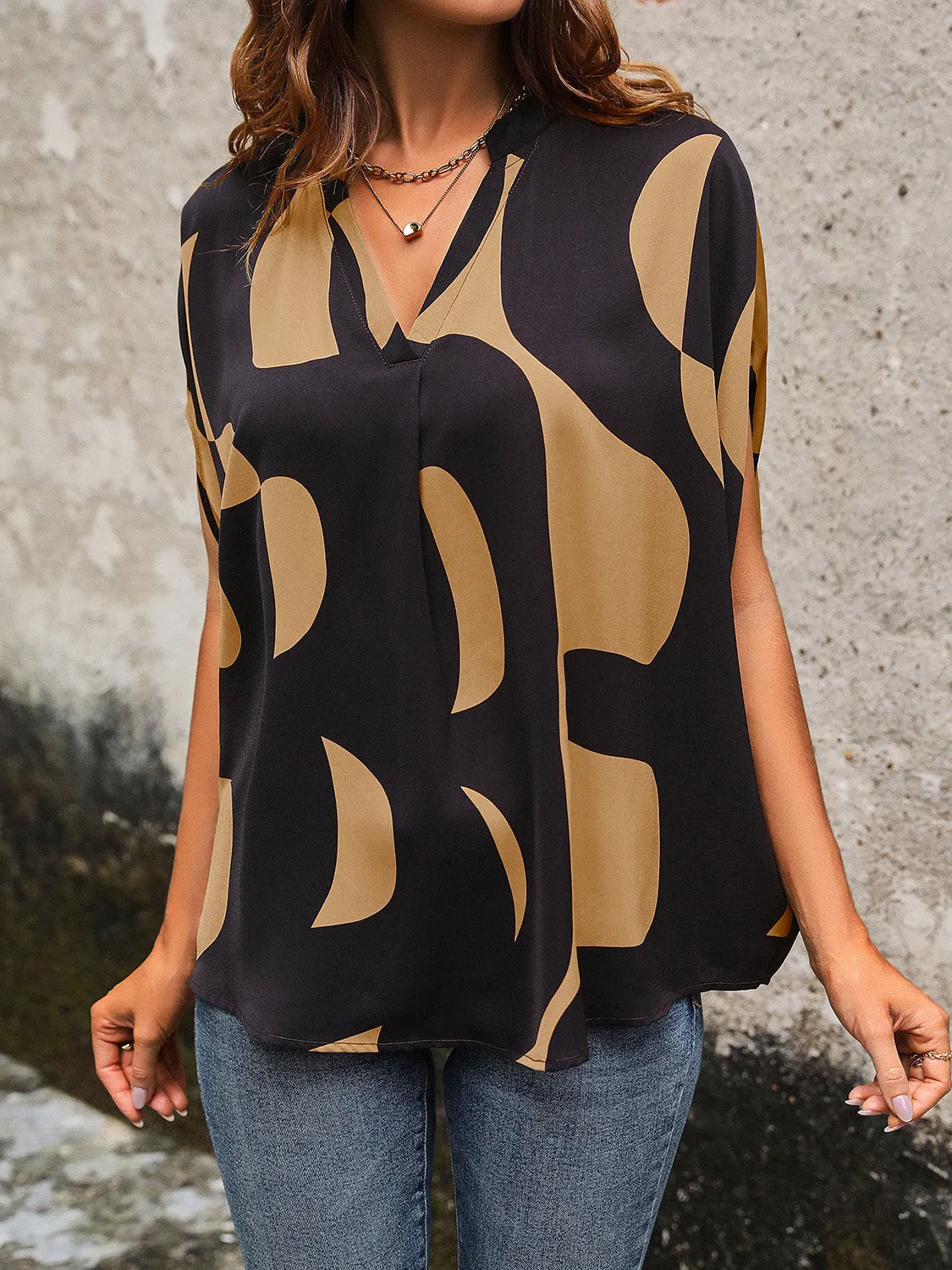 Printed Notched Slit Half Sleeve Blouse sold by Charming Charlie product image thumbnail 4