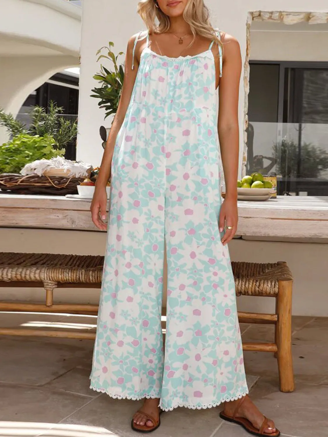 Printed Wide Leg Jumpsuit with Pockets sold by Charming Charlie