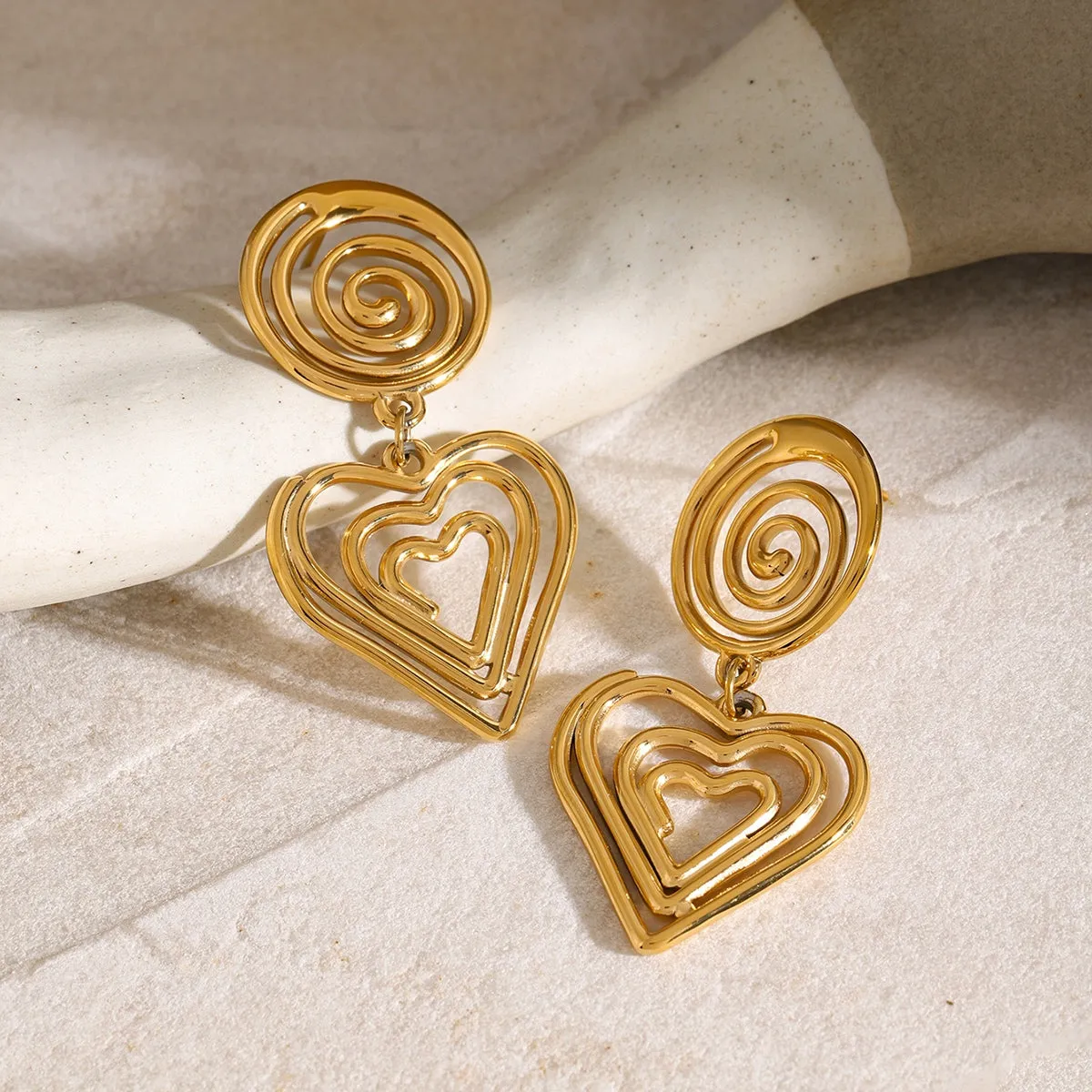 Stainless Steel Heart Earrings sold by Charming Charlie product image thumbnail 2