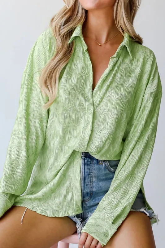 Textured Collared Neck Long Sleeve Shirt sold by Charming Charlie