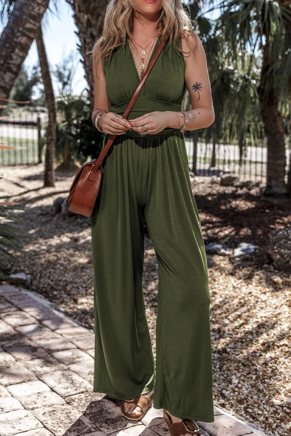 V-Neck Sleeveless Wide Leg Jumpsuit sold by Charming Charlie