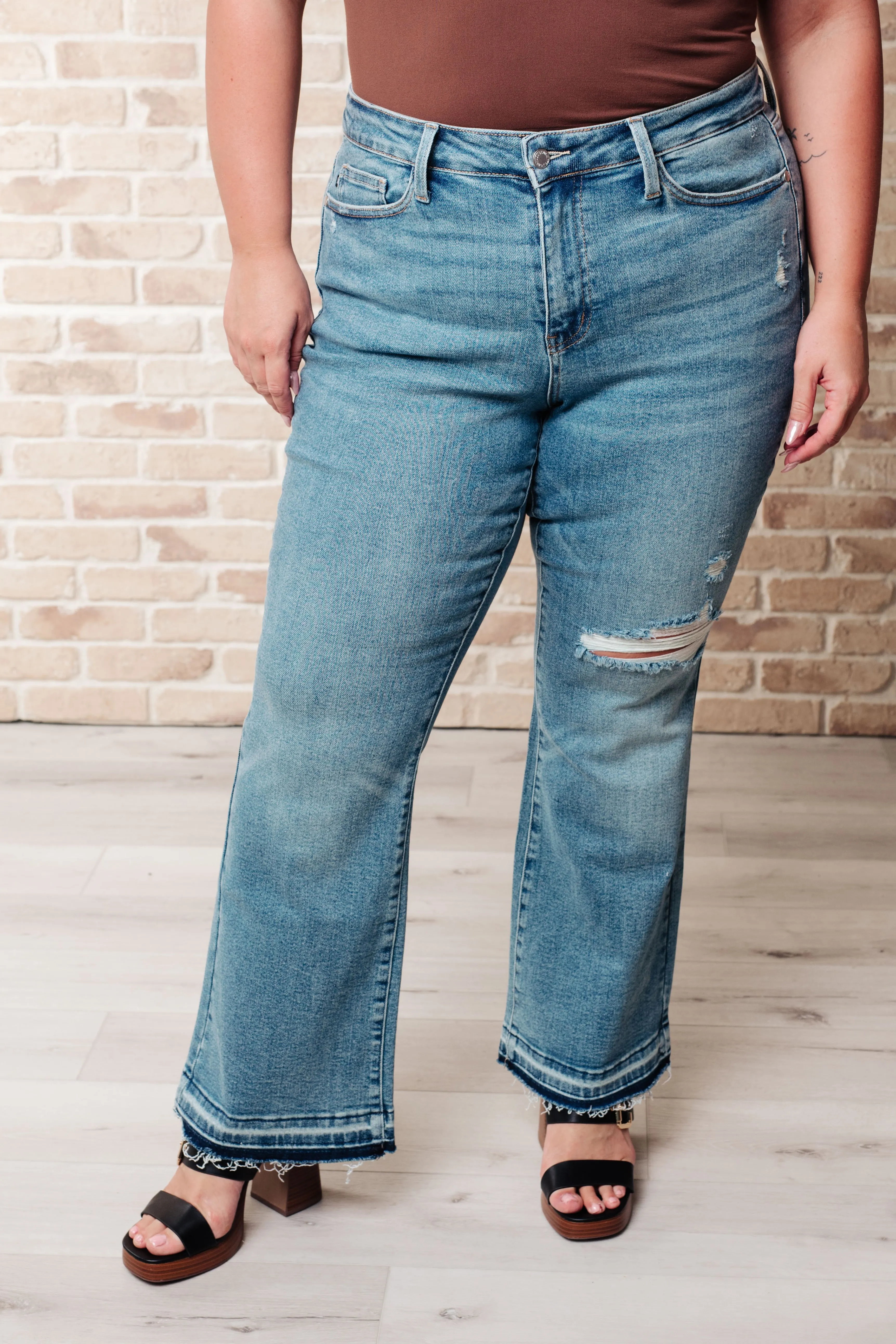 Isla Mid Rise Distressed Released Hem Bootcut Jeans sold by Charming Charlie product image thumbnail 3