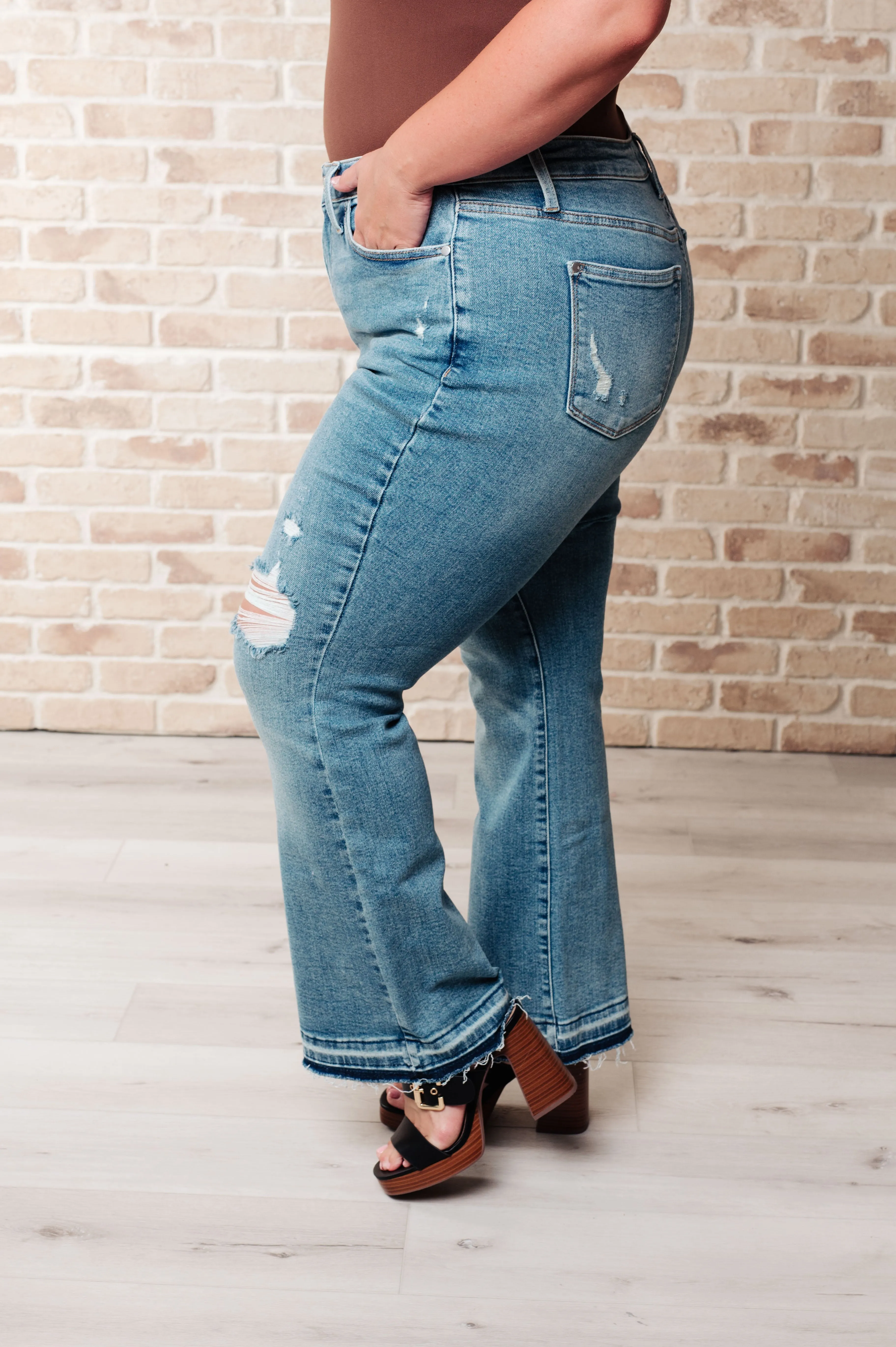 Isla Mid Rise Distressed Released Hem Bootcut Jeans sold by Charming Charlie product image thumbnail 5