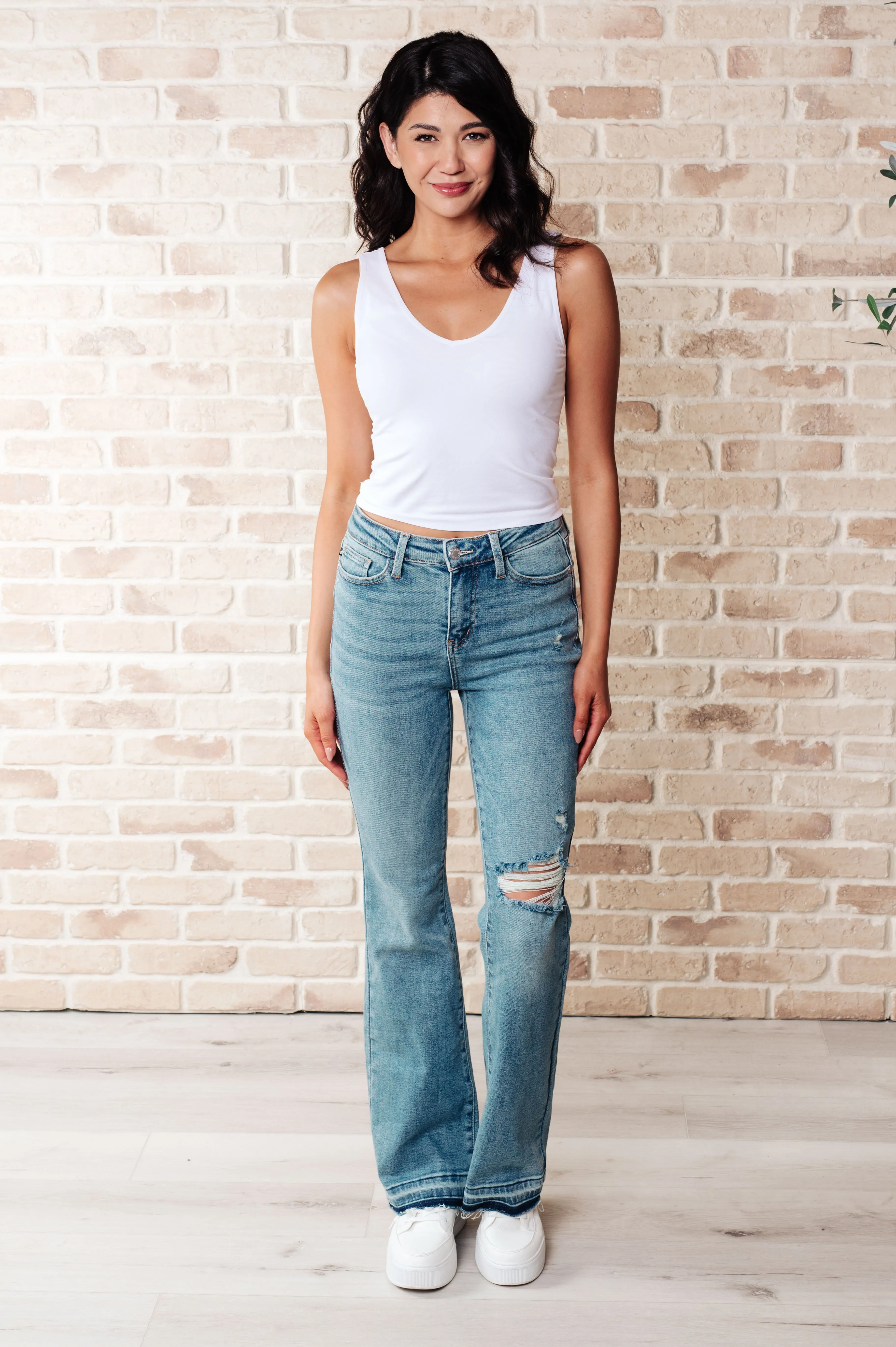 Isla Mid Rise Distressed Released Hem Bootcut Jeans sold by Charming Charlie product image thumbnail 2